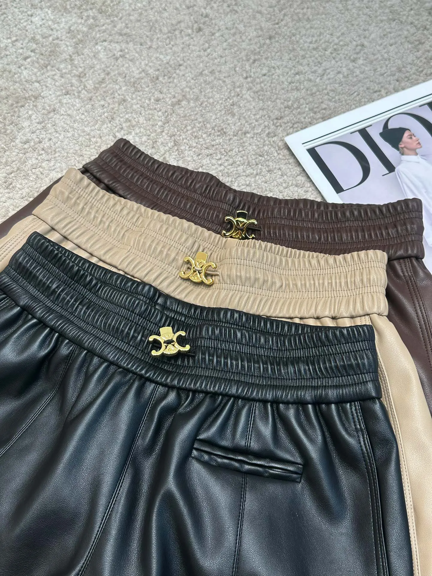 Metal buckle elastic high waist leather shorts
